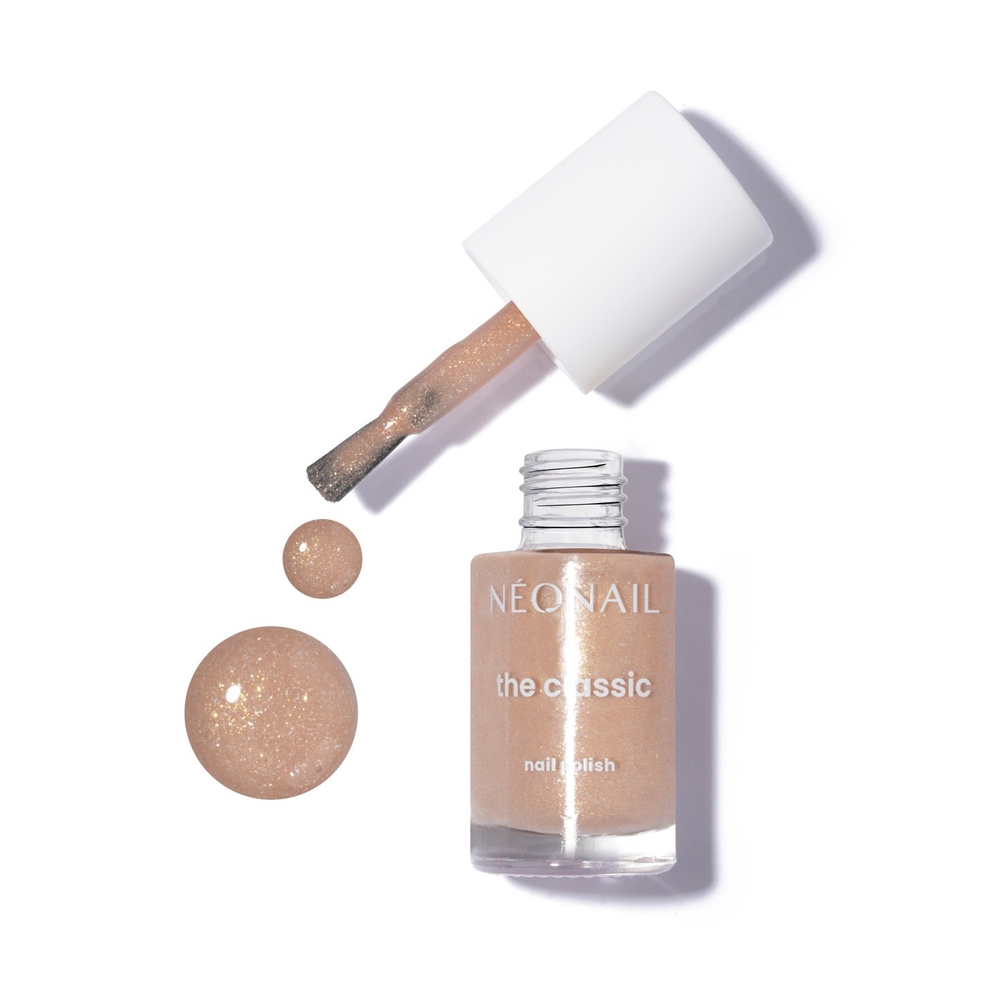 Beżowy lakier klasyczny ze złotymi drobinami: Sunkissed Glow Beige &ndash; rozświetlone paznokcie
