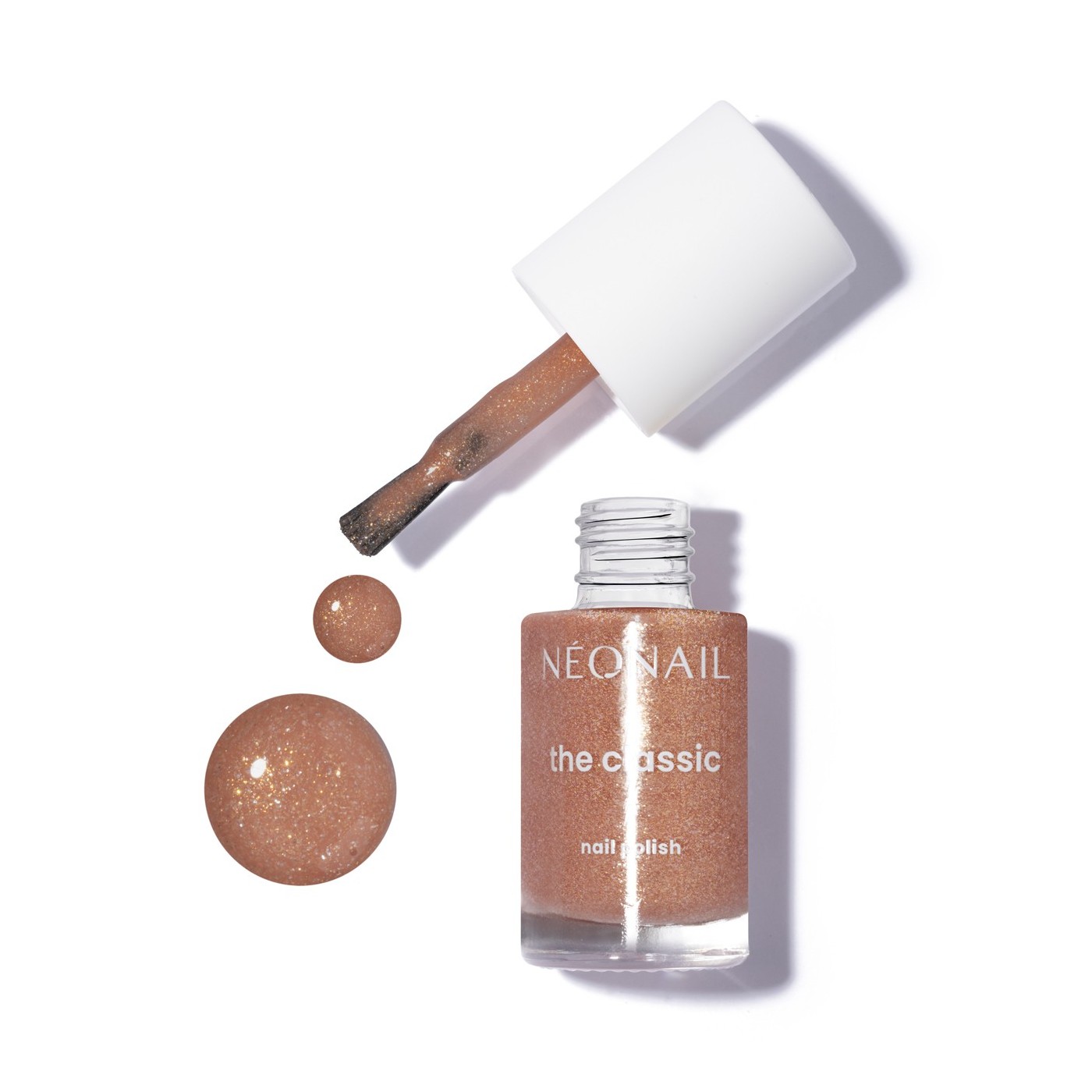 Brązowy lakier klasyczny z lśniącymi, złotymi drobinami: Sunkissed Glow Bronze &ndash; paznokcie jak muśnięte słońcem