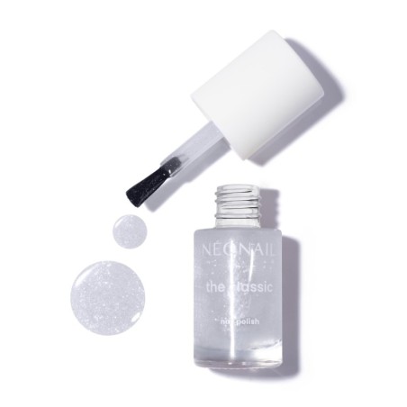 Lakier klasyczny z rozświetlającymi, srebrnymi drobinami: Luminous Glow Silver &ndash; manicure lśniący jak nigdy wcześniej