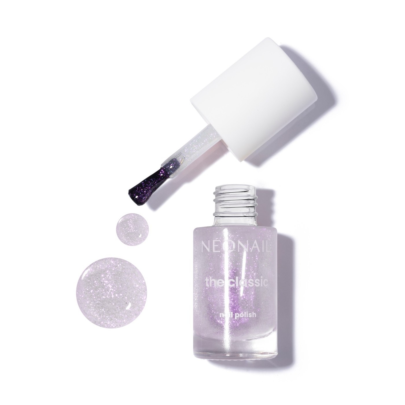 Lakier klasyczny z rozświetlającymi, fioletowymi drobinami: Luminous Glow Purple &ndash; zabłyśnij dzięki manicure